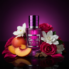 Ganelli No. 6 for Her perfume bottle in purple with pink label, an Eau de Parfum, surrounded by peaches and roses.