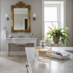 Ganelli No. 1 for Her perfume bottle on marble bathroom counter beside a folded towel