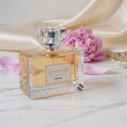 Ganelli No. 3 for Her perfume bottle, clear glass with pale amber liquid and crystal cap, pink flowers